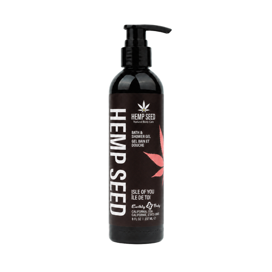 A bottle of Hemp Seed Bath & Shower Gel by Earthly Body, featuring a black pump bottle with a dark brown label, white text, and a pink leaf graphic on a white background.