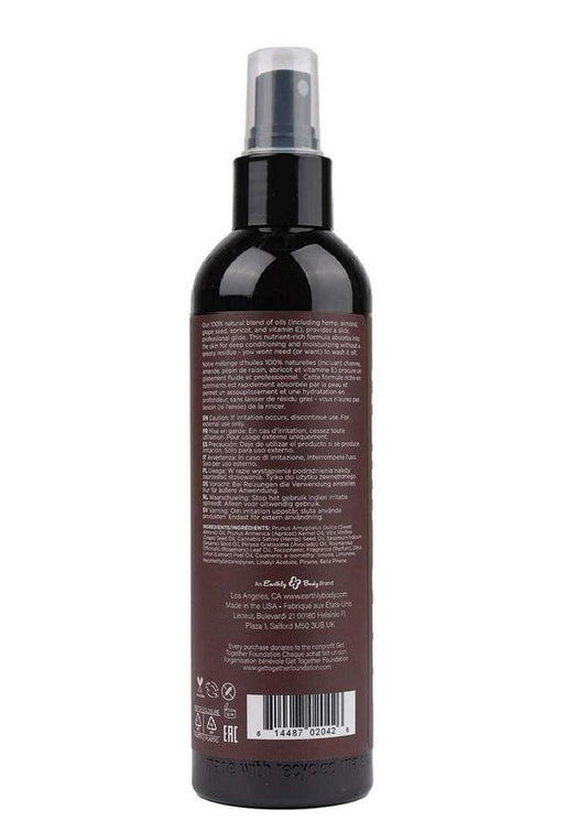 Hemp Seed Moisturizing Body Oil black spray bottle with label on white background
